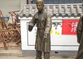 步行街擺放站姿店小二玻璃鋼仿銅雕塑